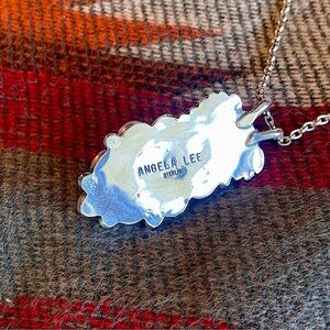 Angela Lee sterling silver pendant with a 925 chain. including a new Pistil wrap